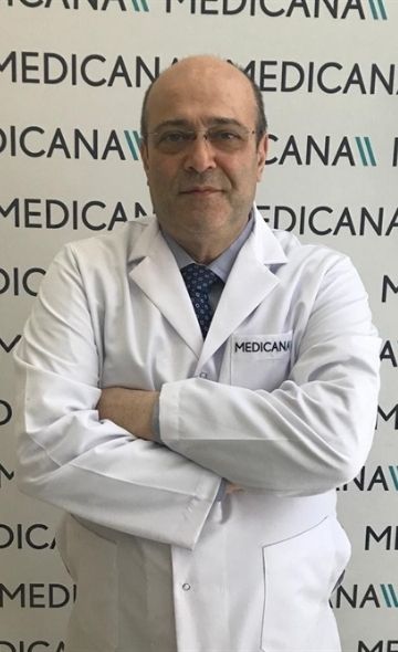 Dr. Behram Danis